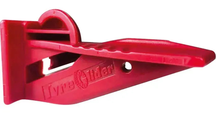 Red tyre lever tool on a white background
