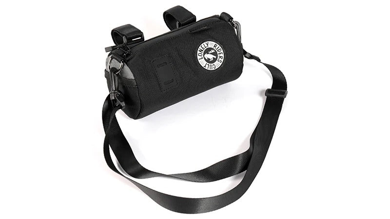 Black bike handlebar bag with straps extended against a white background