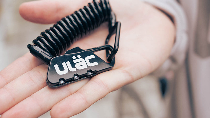 A picture of the Ulac Picadilly combo bicycle lock in someone's hand