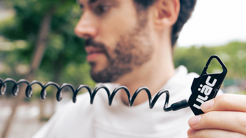 A man holding the Ulac Picadilly Bicycle Lock