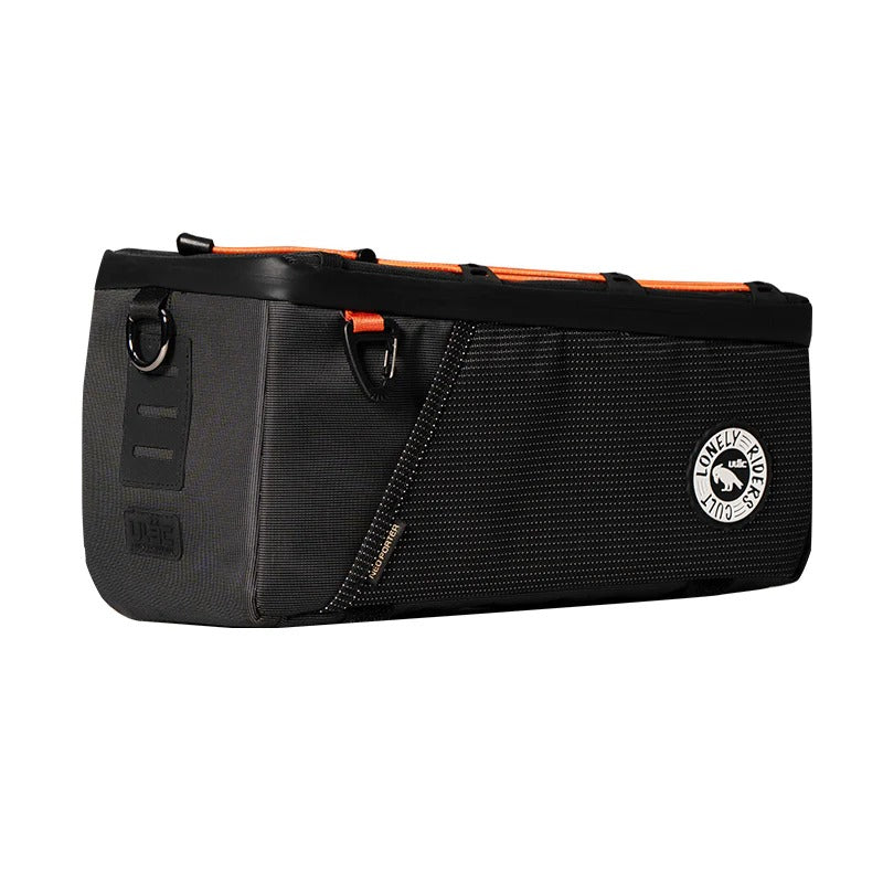 Black and orange bicycle panniebag with a visible brand logo on a white background 