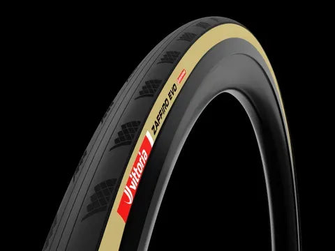 Close-up of a road bike tyre with the Vittoria Zaffiro Evo brand logo on a black background
