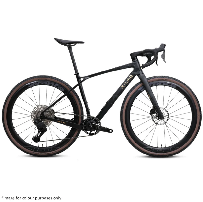 Black X-LAB Gravel bike with brown tyres on a white background