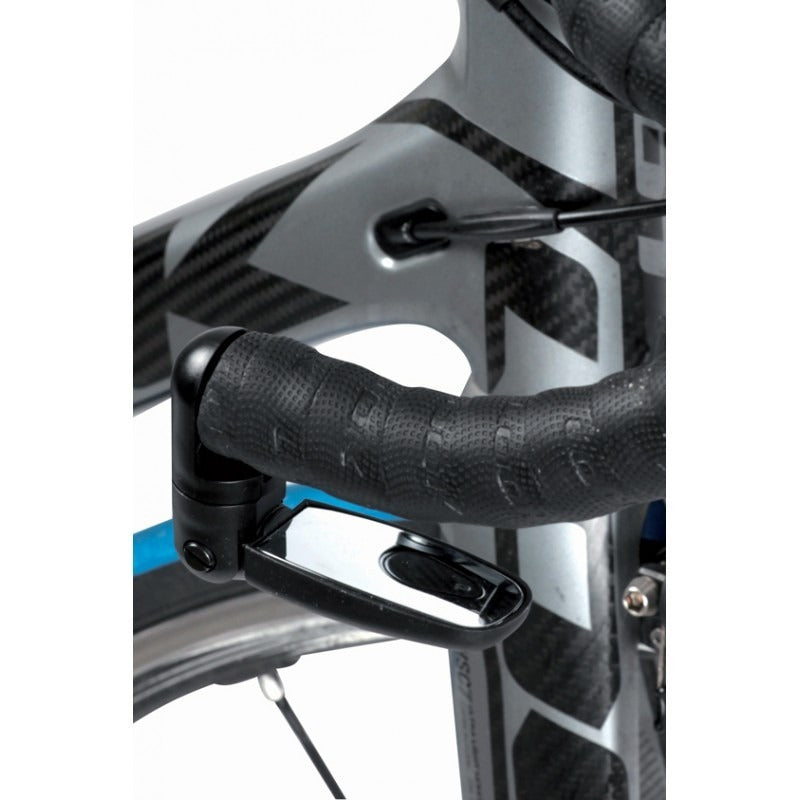 Close-up of a road bike handlebar with mirror attached to the drop bar and silver frame on a white background