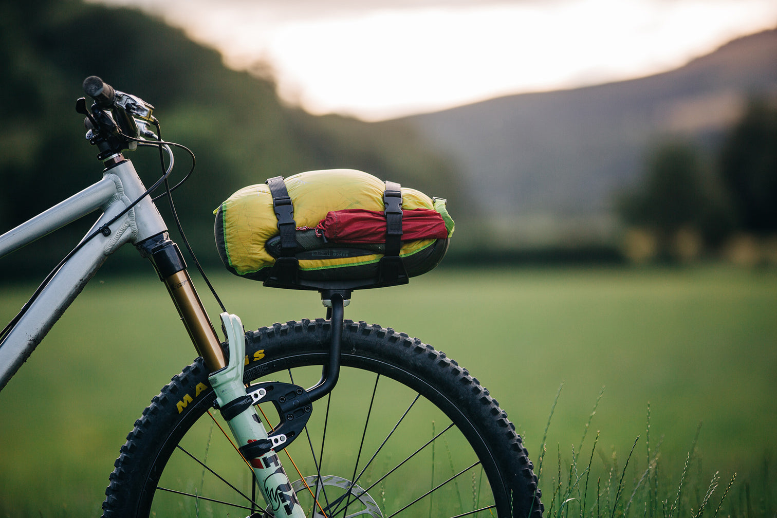 A picture of the Aeroe Front Bike Rack attached to a bike with a bag