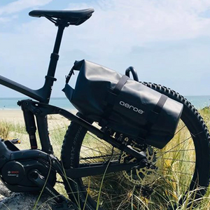 A picture of the Aeroe Spider Rear Bicycle Rack with a bag attached to a bike