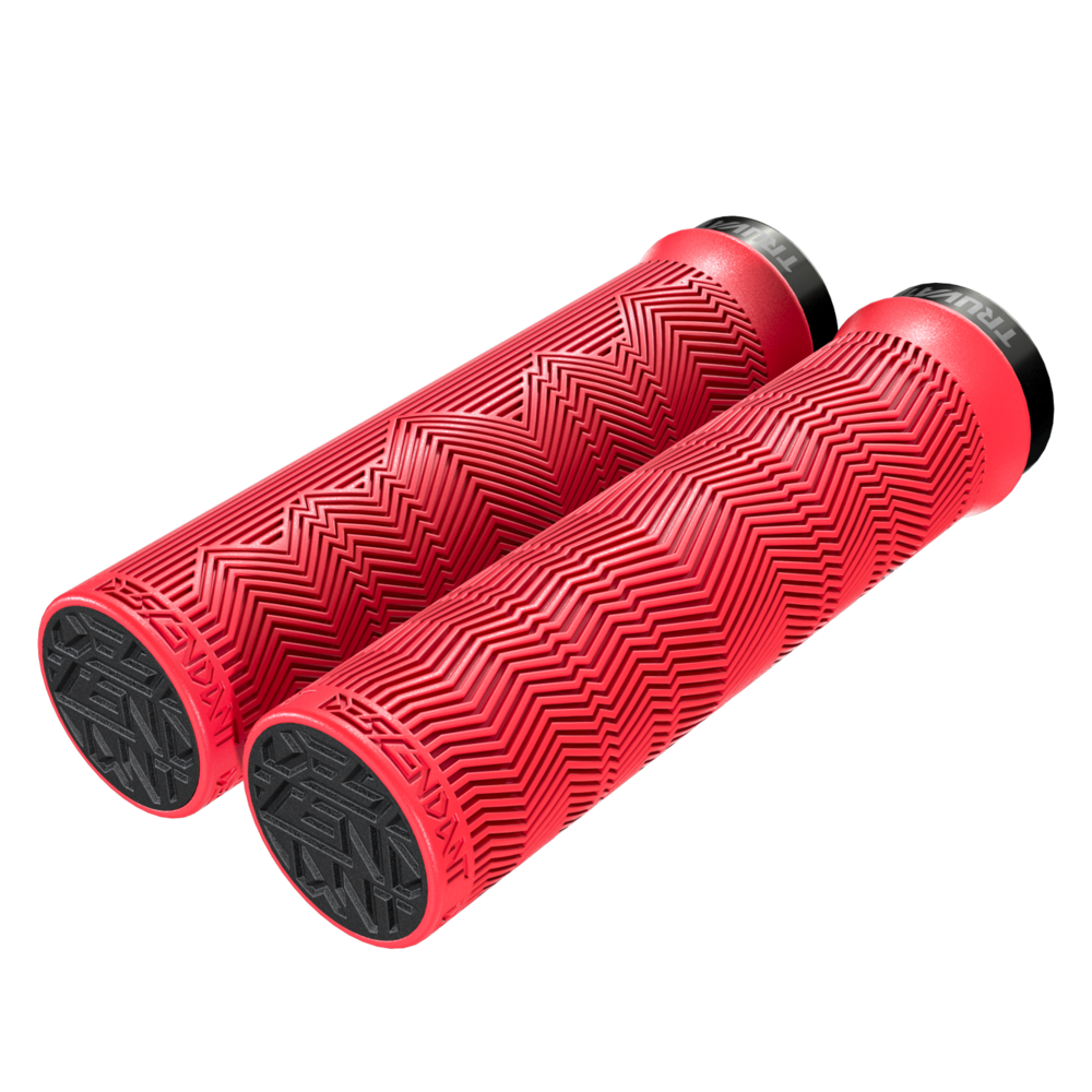 Red bicycle handlebar grips with black textured ends on a white background
