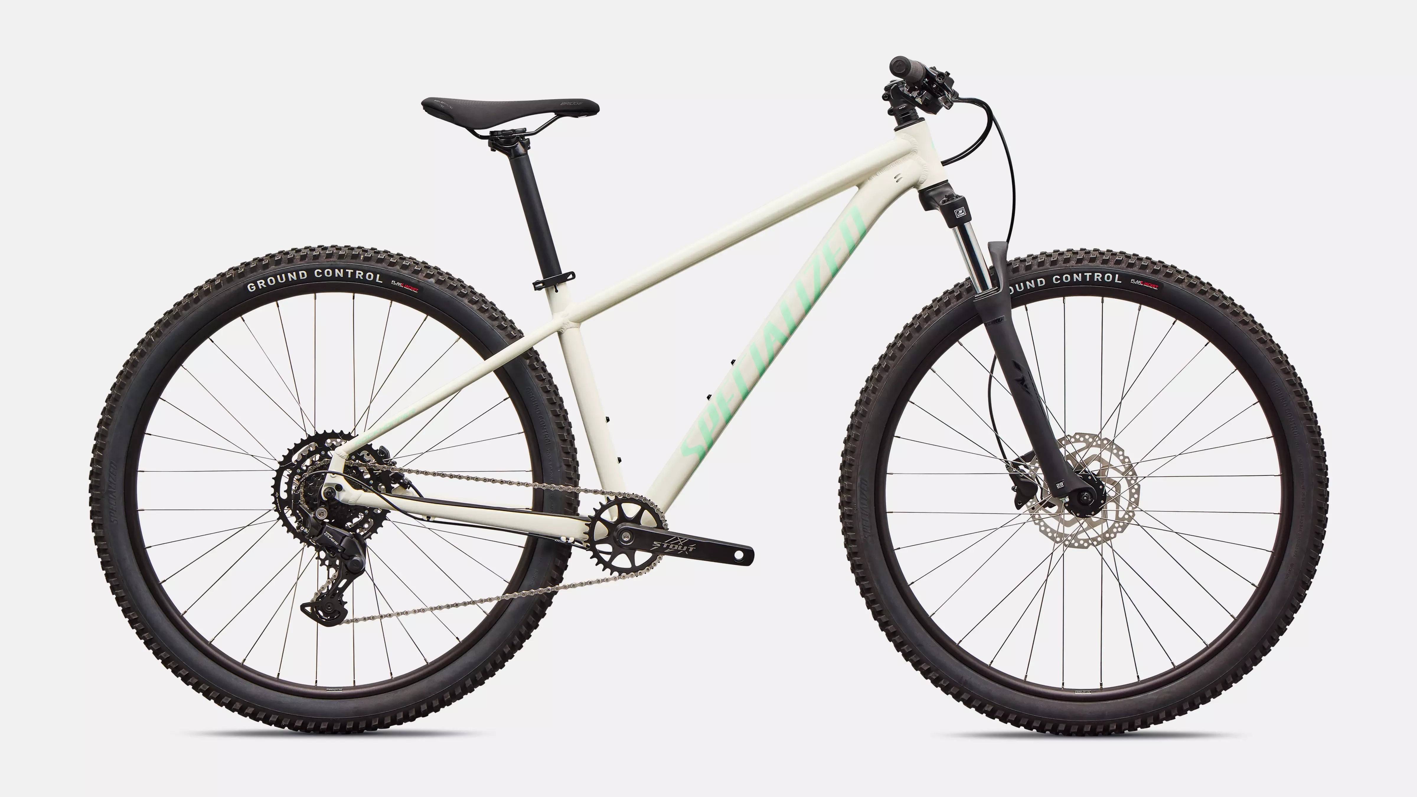 Specialized mountain bike with a white frame and black tires on a white background