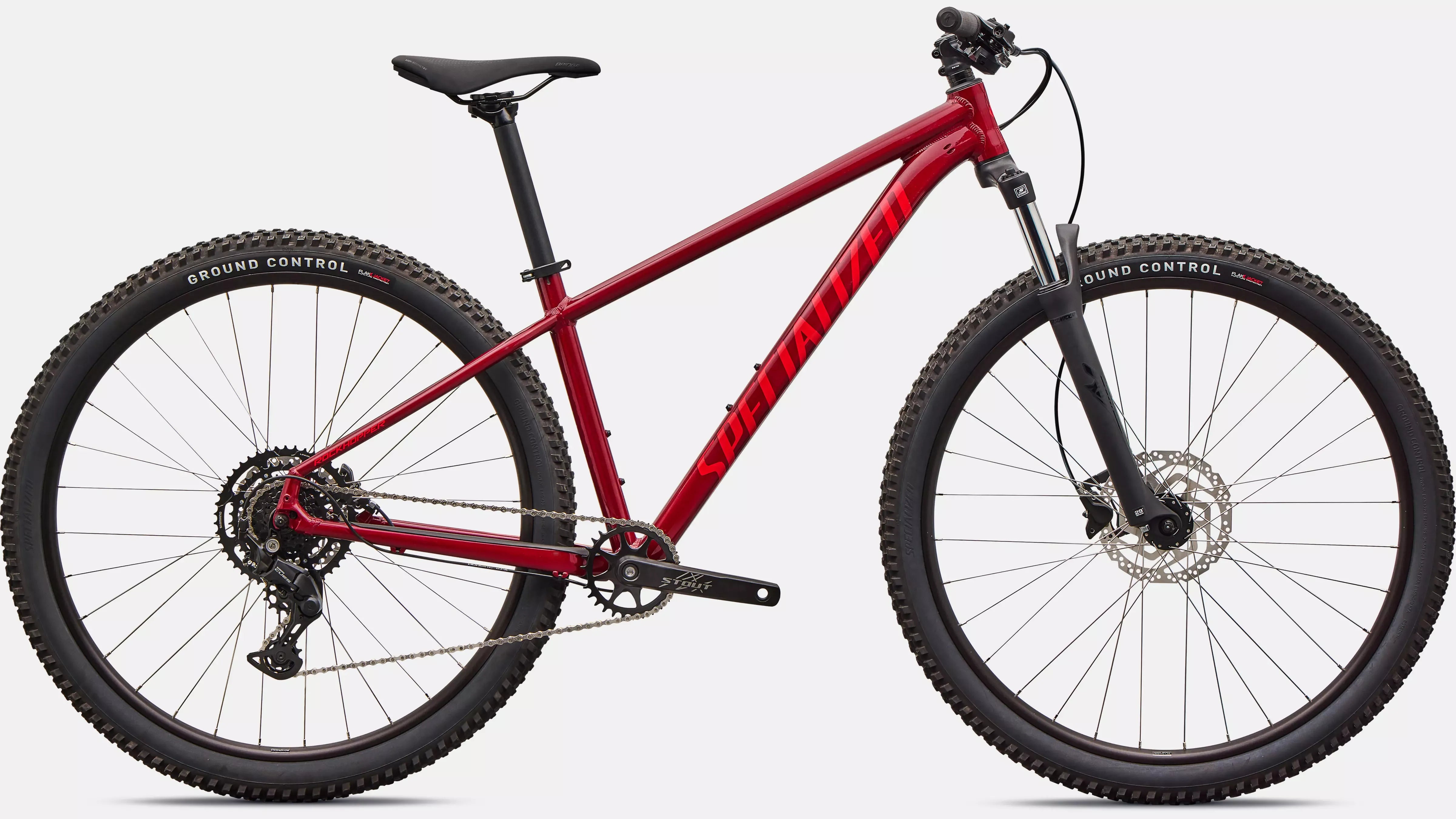 Maroon Specialized mountain bike on a white background