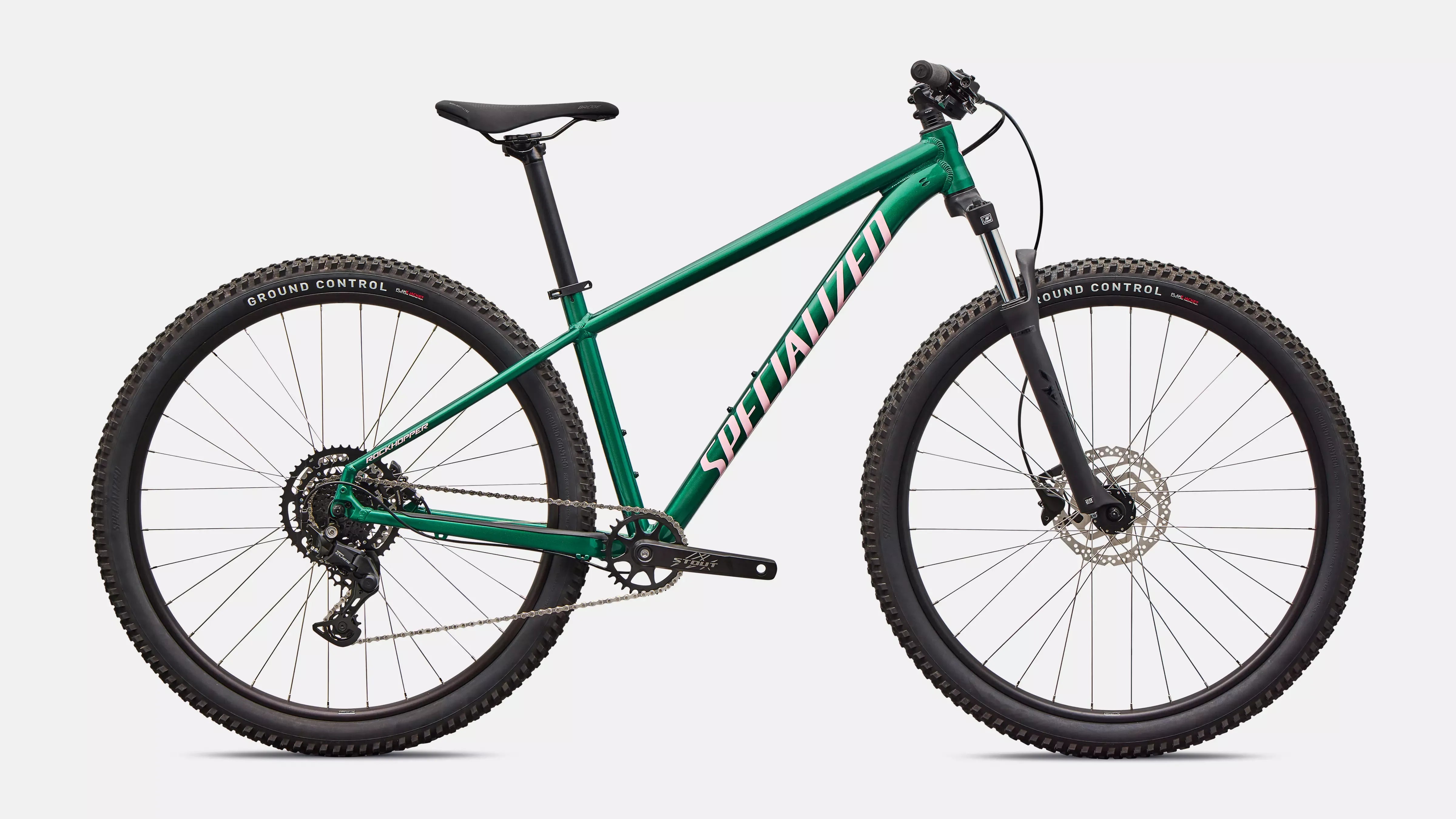 Green Specialized mountain bike on a white background