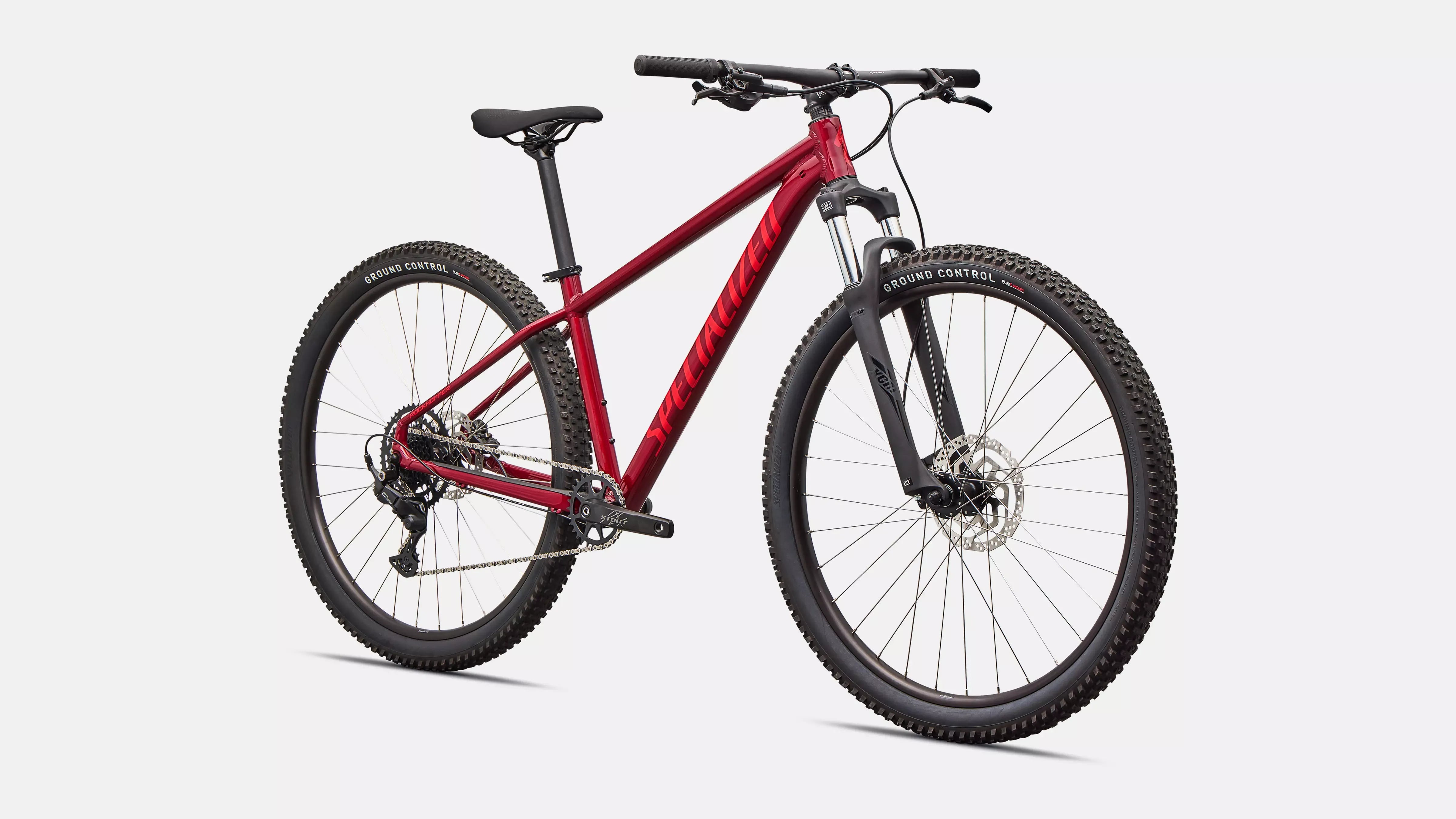 Red Specialized mountain bike on a white background