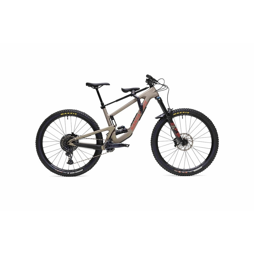 A picture of a beige dual suspension mountain bike with a Shotgun front mounted kid's seat mounted on the frame on a white background