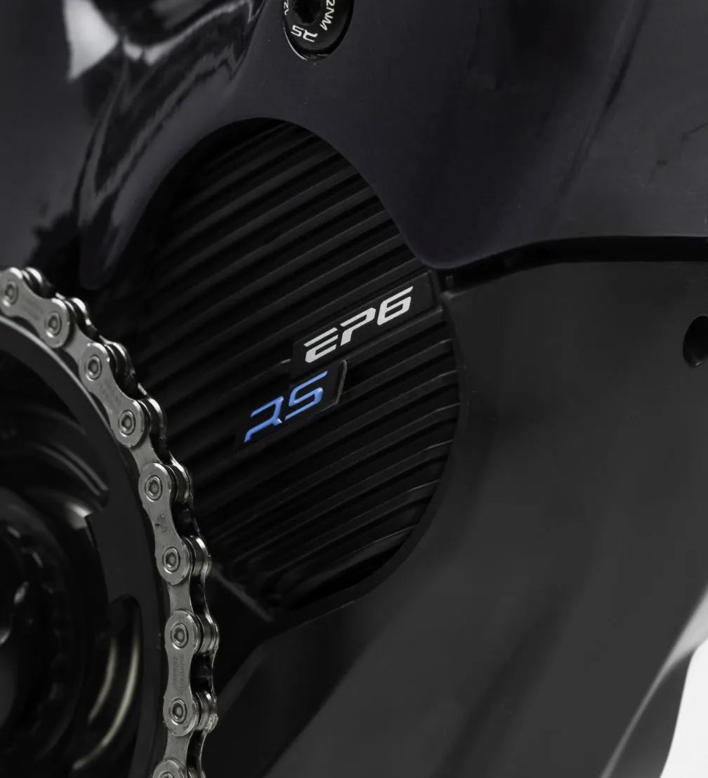 Close up of a mid drive motor on an electric mountain bike