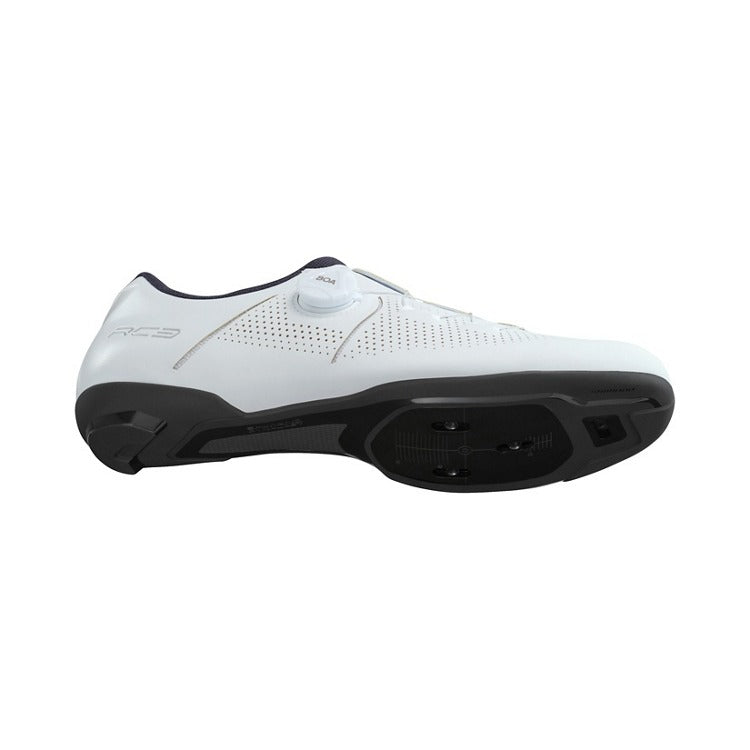 White cycling shoe with black sole on a white background