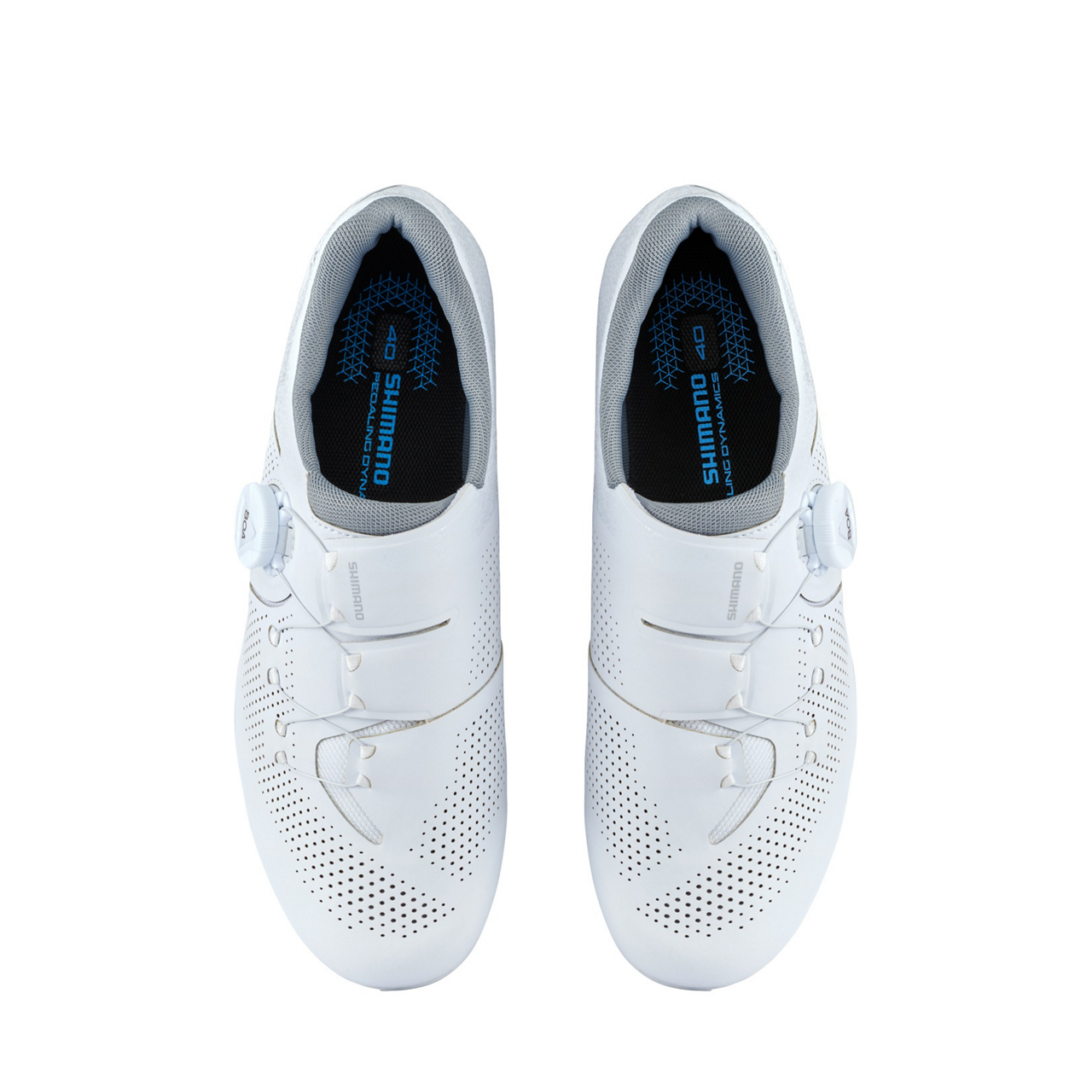 Pair of white cycling shoes with Shimano logo on a white background