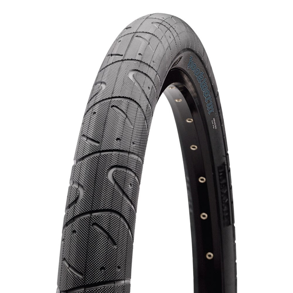 Bicycle tyre with tread pattern and brand name on a white background