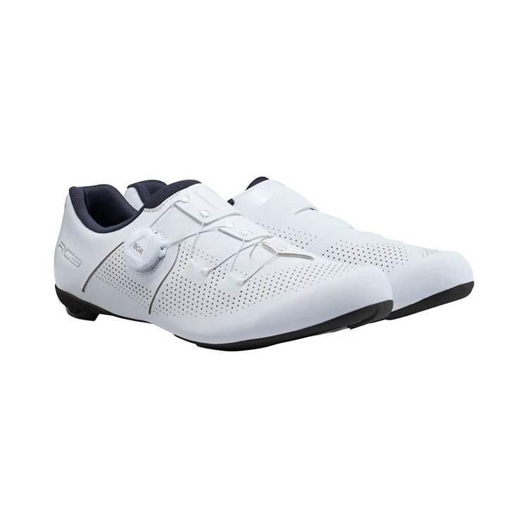 White Shimano RC3 cycling shoes with black soles on a white background