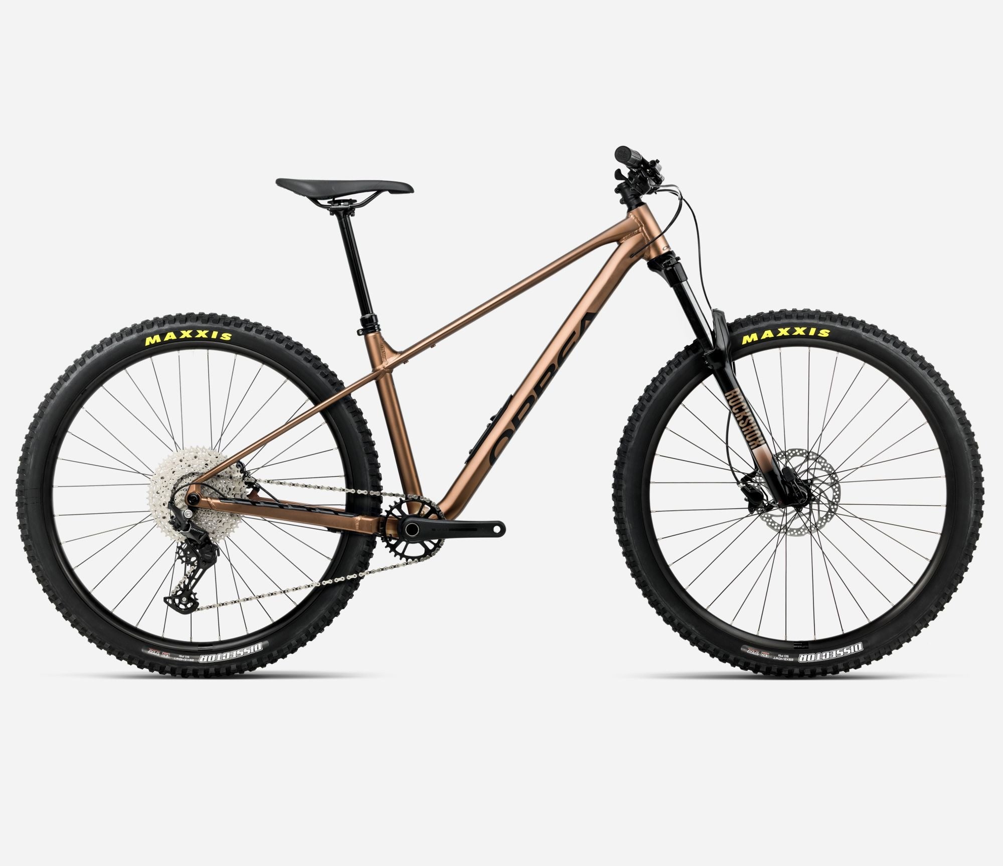 Bronze Orbea ountain bike with Maxxis tyres on a white background