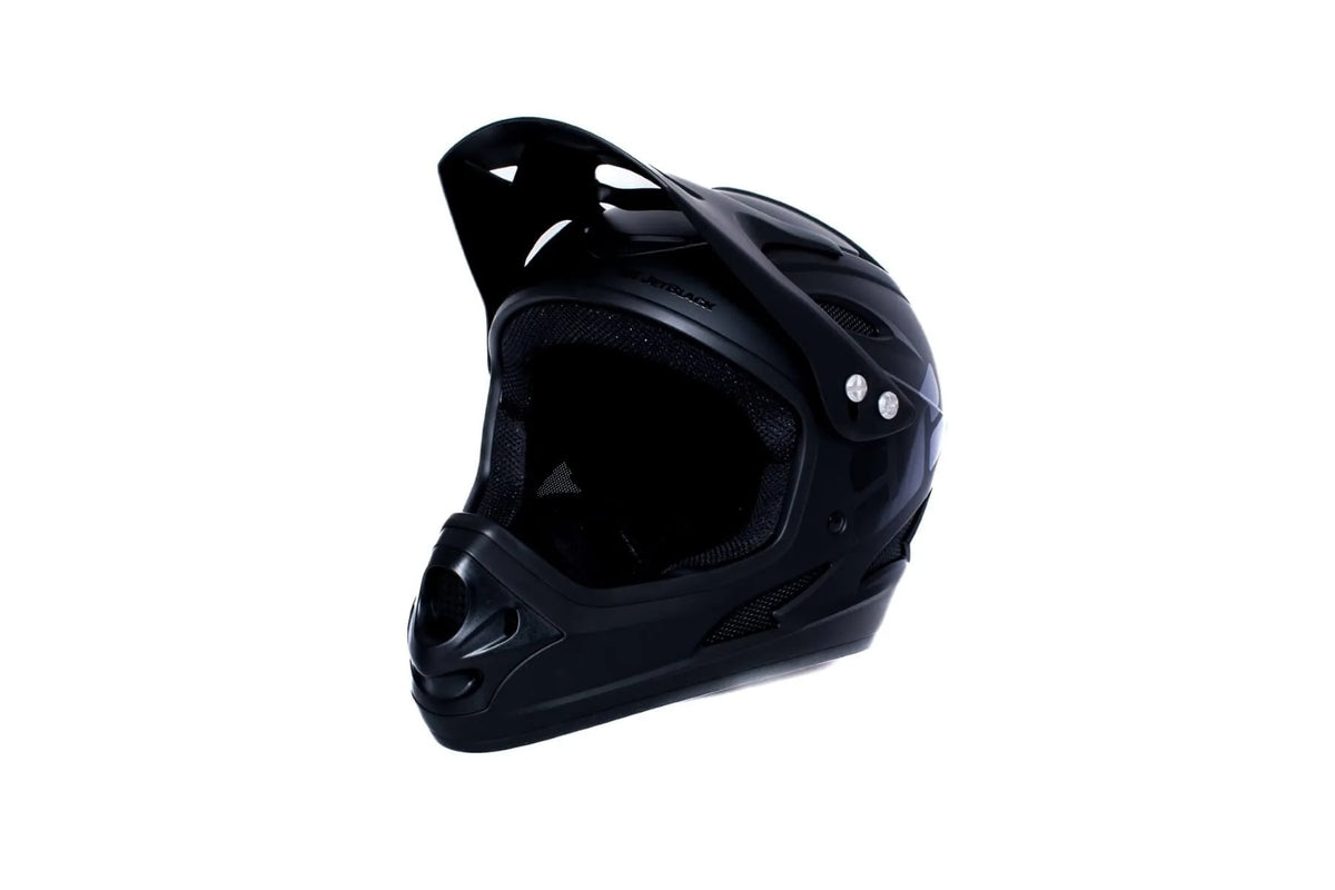 A black full face mountain bike helmet on a white background