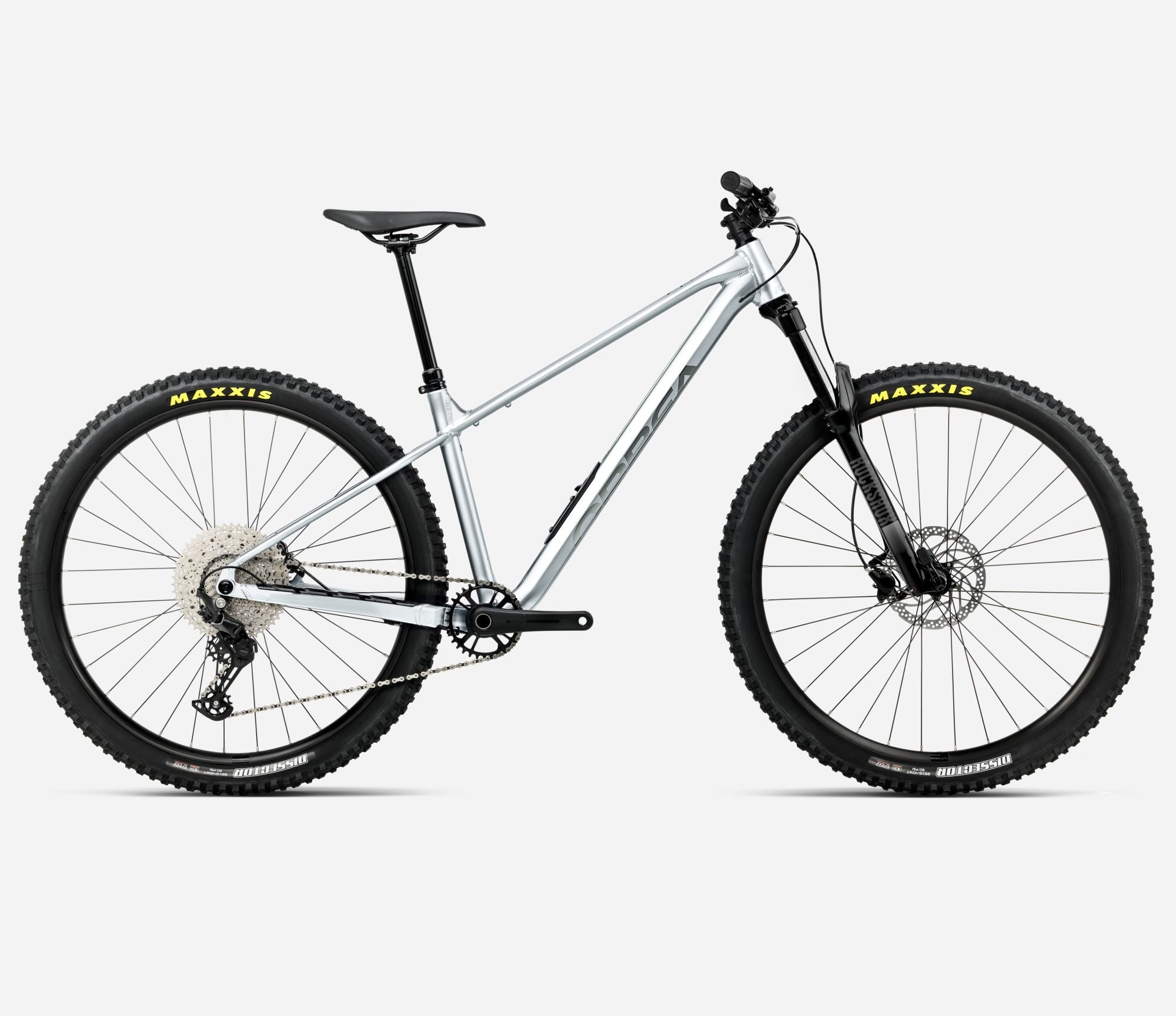 Silver Orbea mountain bike with black tyres on a white background