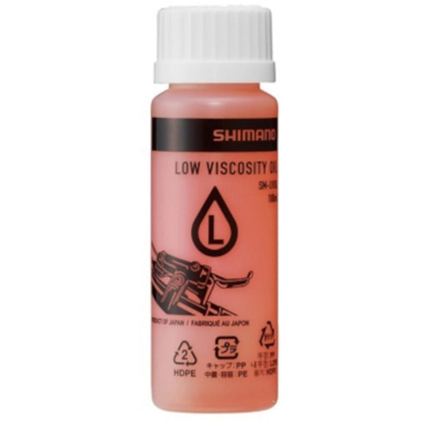 Shimano low viscosity oil bottle on a white background