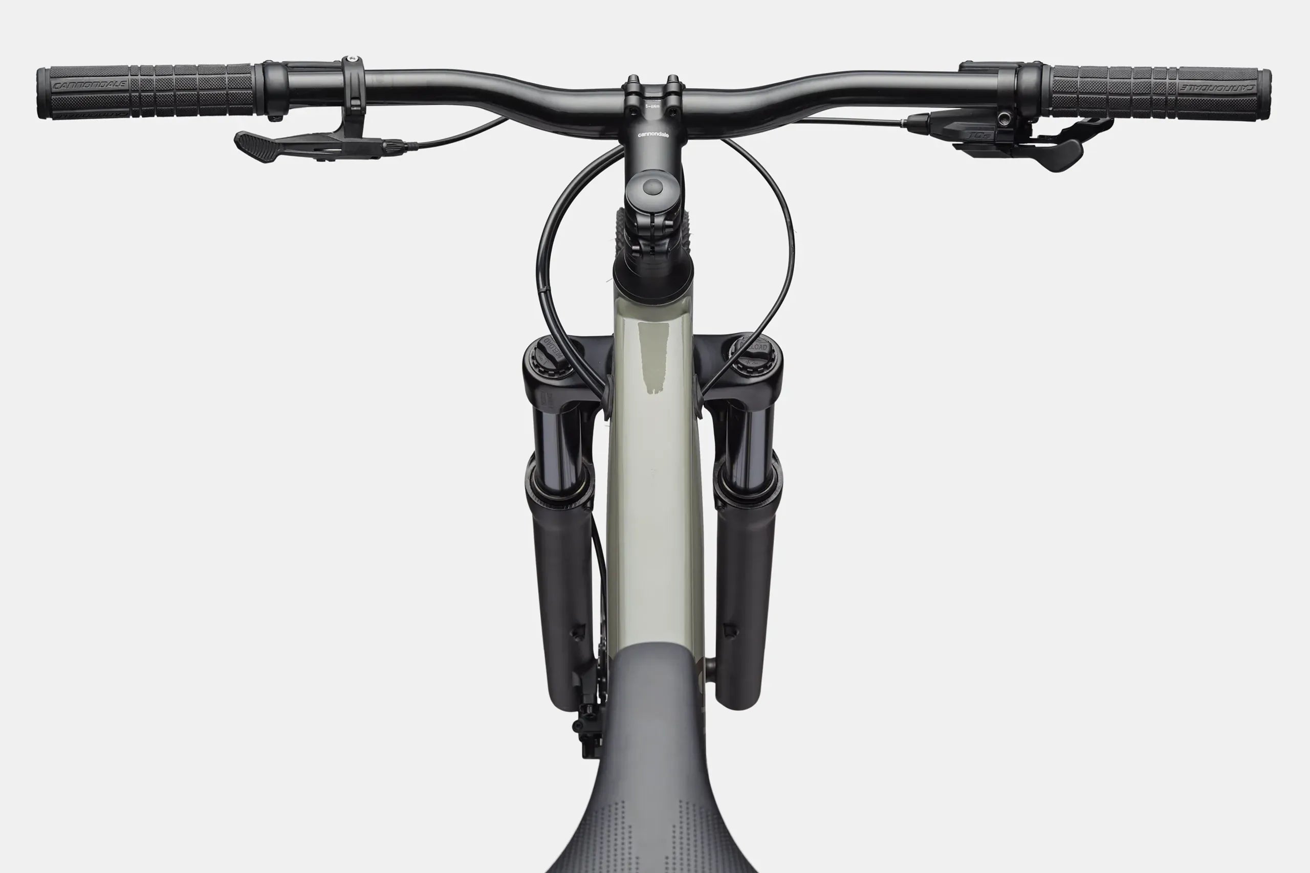 Close-up of a bicycle handlebar and frame on a white background