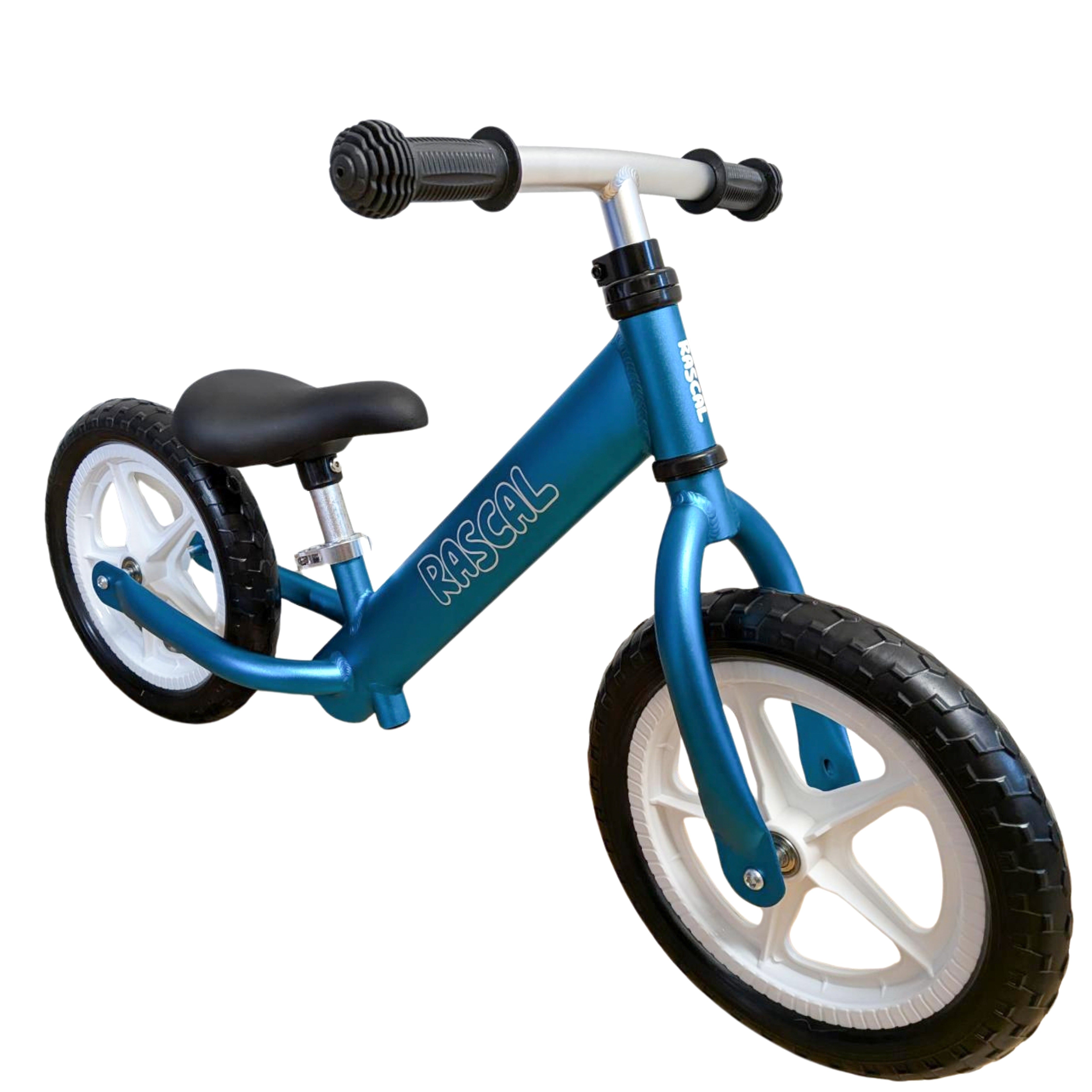 Blue Rascal balance bike with black seat and tires on a white background