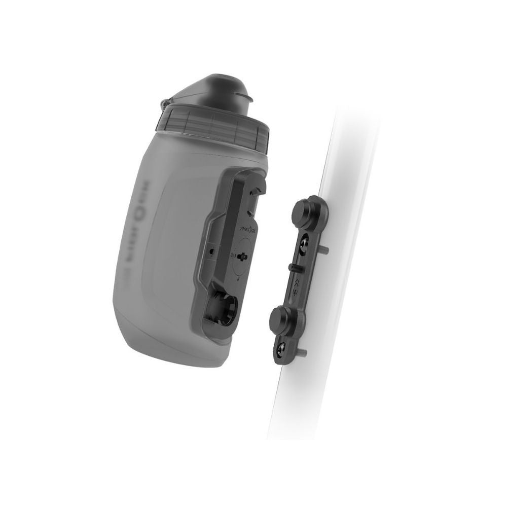 Fidlock twist water bottle with attachment to bike on a white background