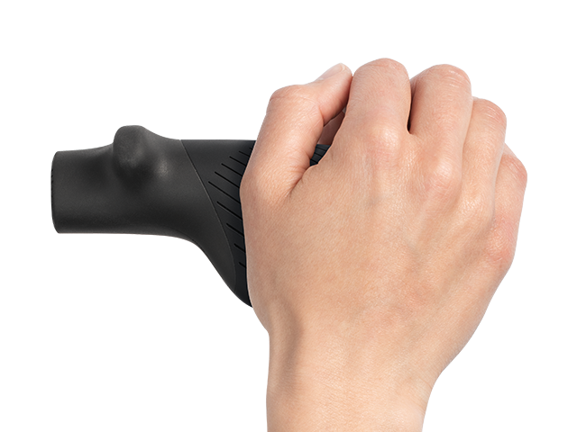 Hand holding a black bicycle handgrip on a white background