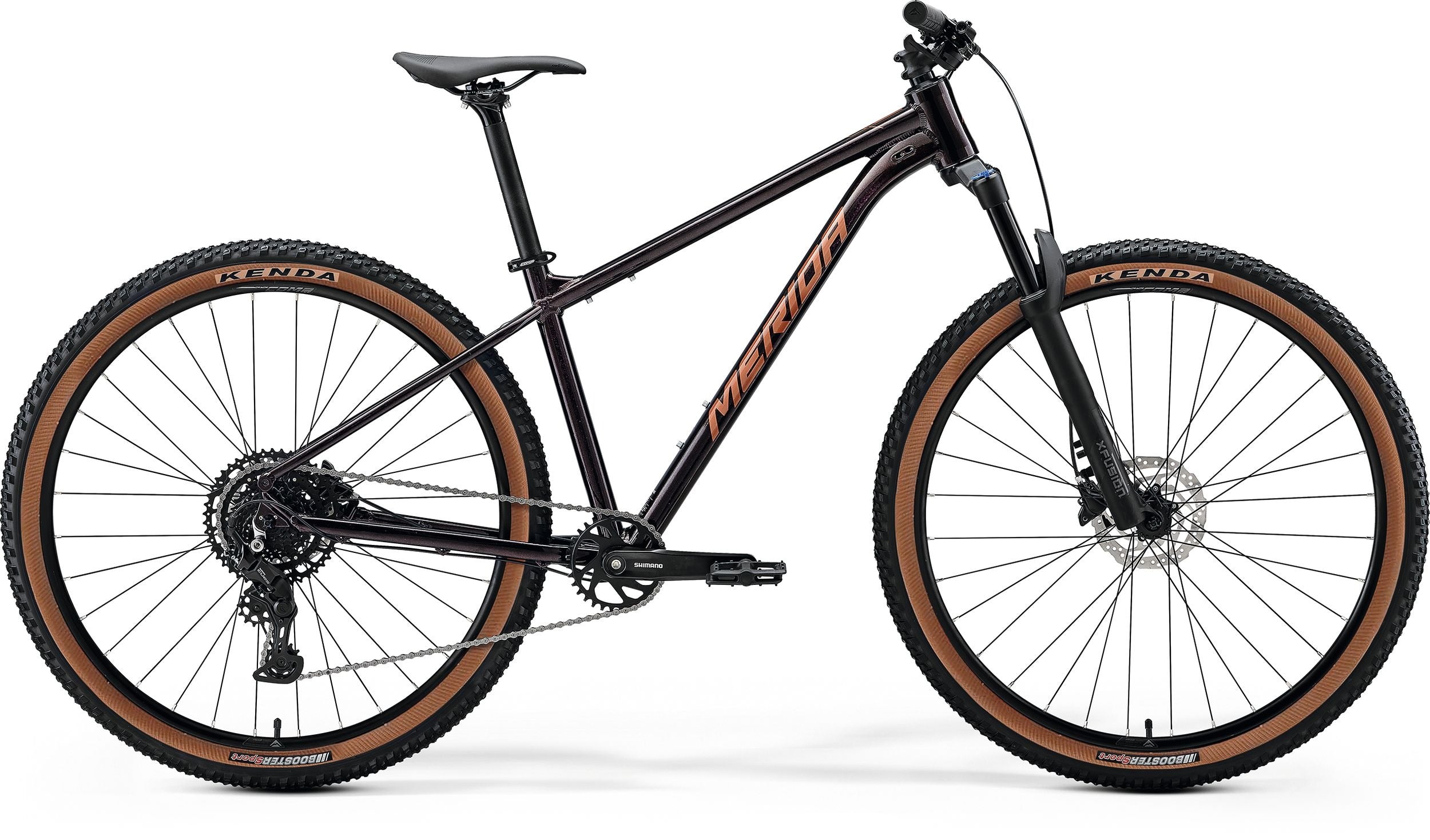 Black Merida Mountain bike with brown tyres on a white background