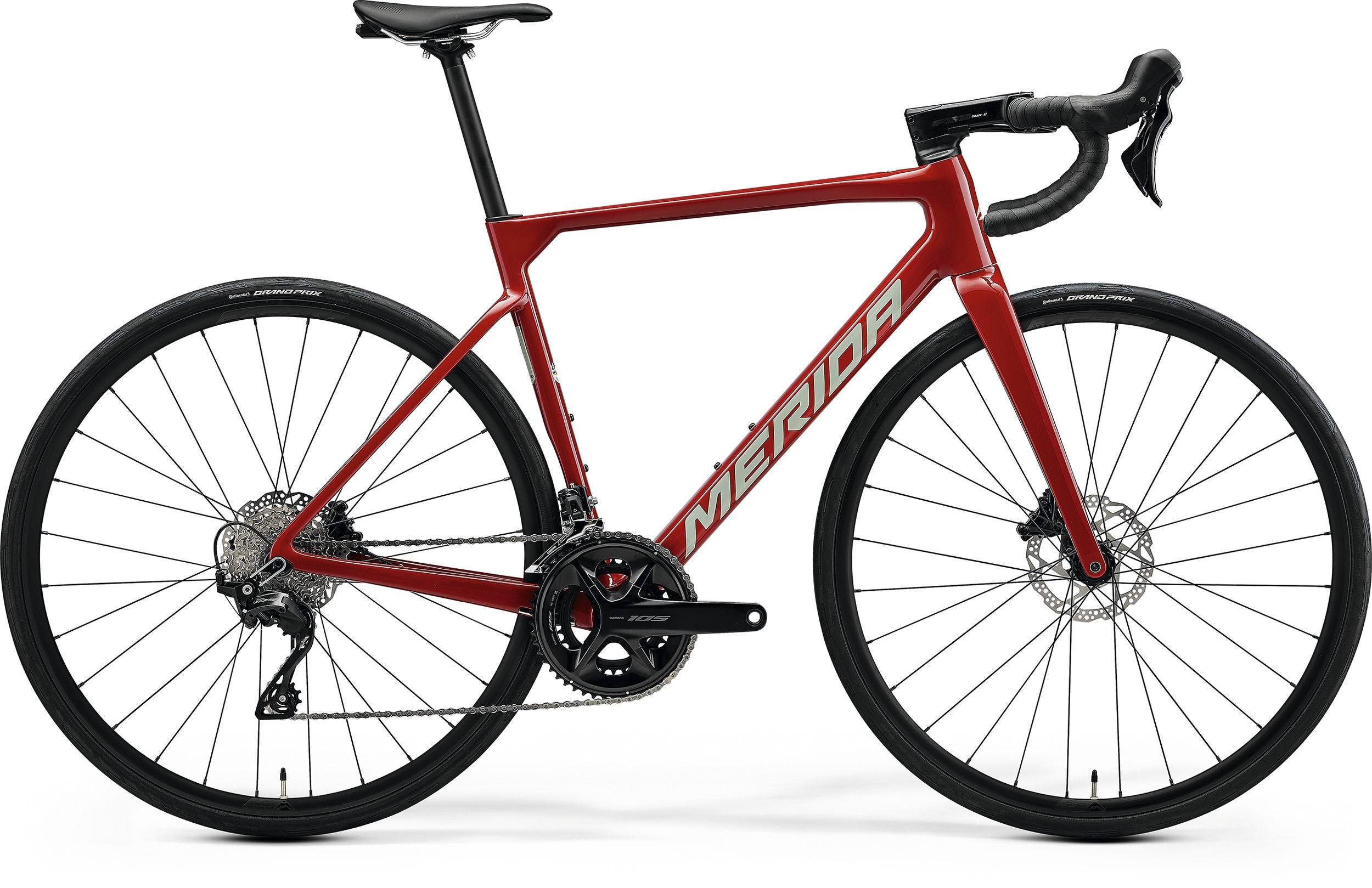 Red road bike with 'Merida' branding on a white background