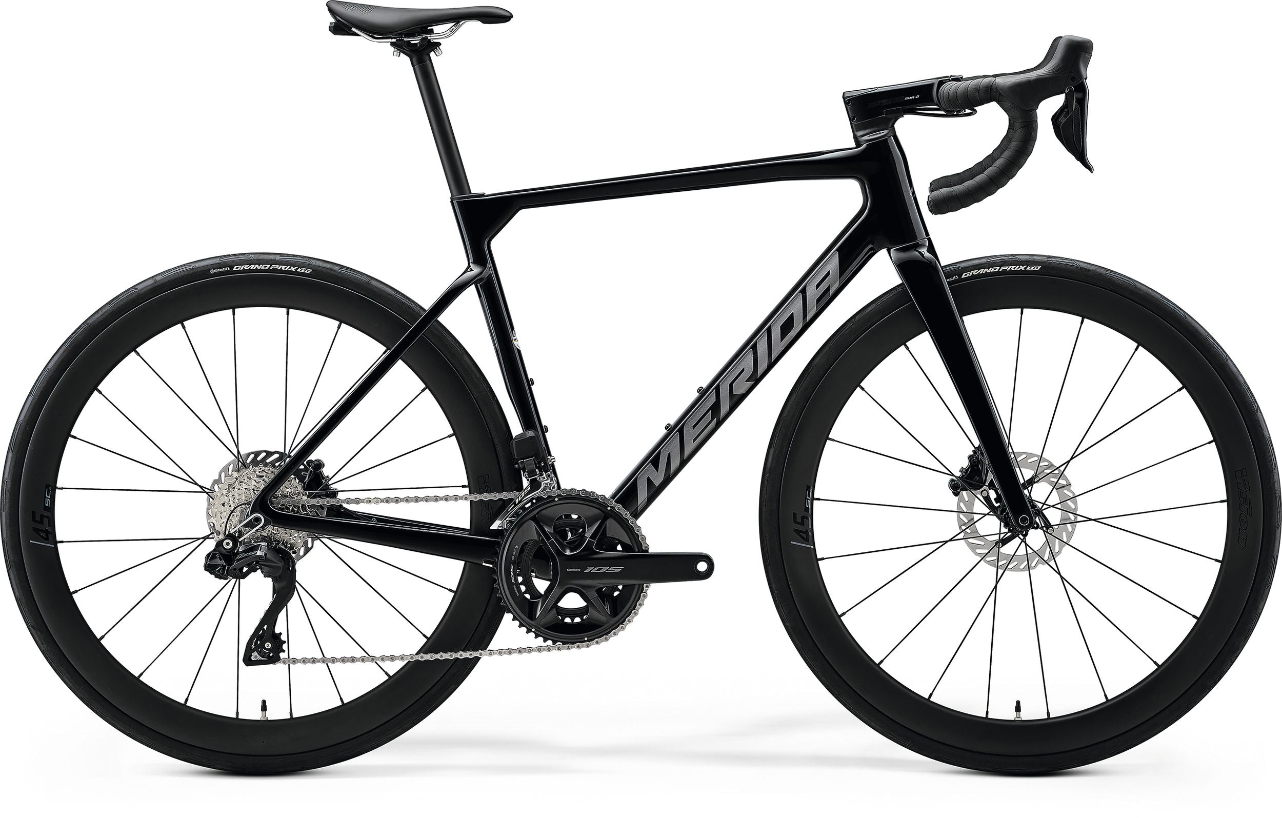 Black Merida road bike on a white background