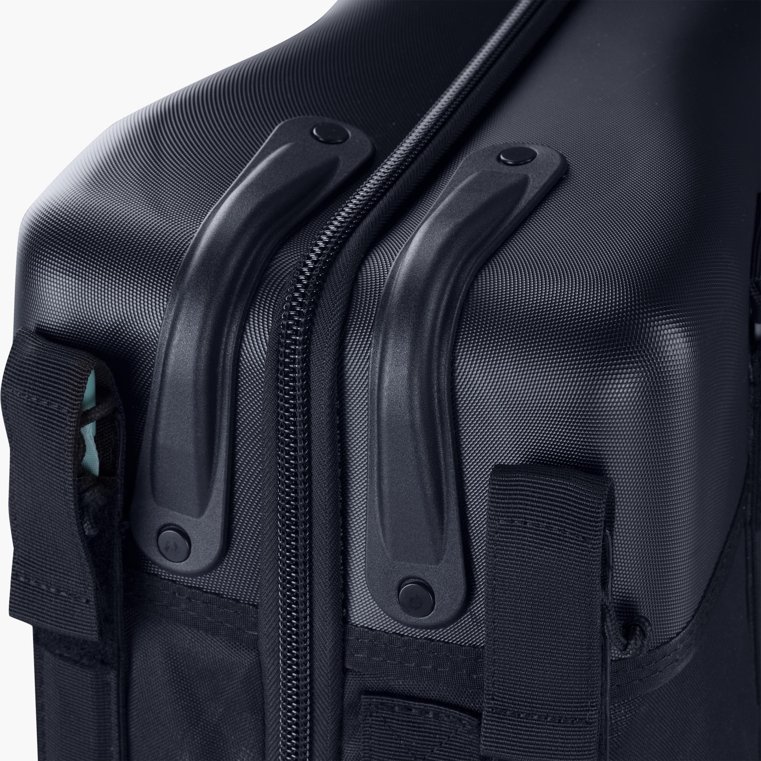 Close-up of a black travel bike bag with a zipper and handle on a white background