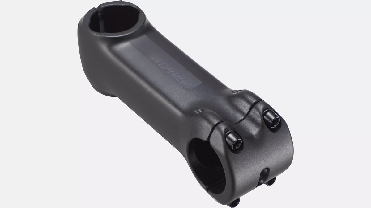 A matte black bicycle stem shown on a plain white background.