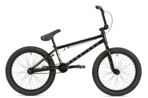 Black BMX bike on a white background