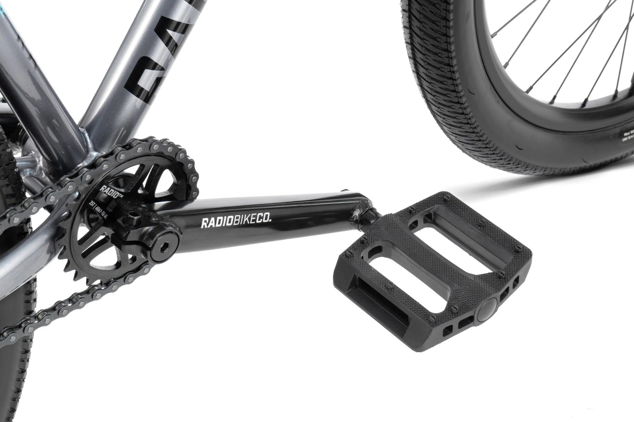 Close-up of a bicycle pedal with 'RadioBikeCo' branding on a white background