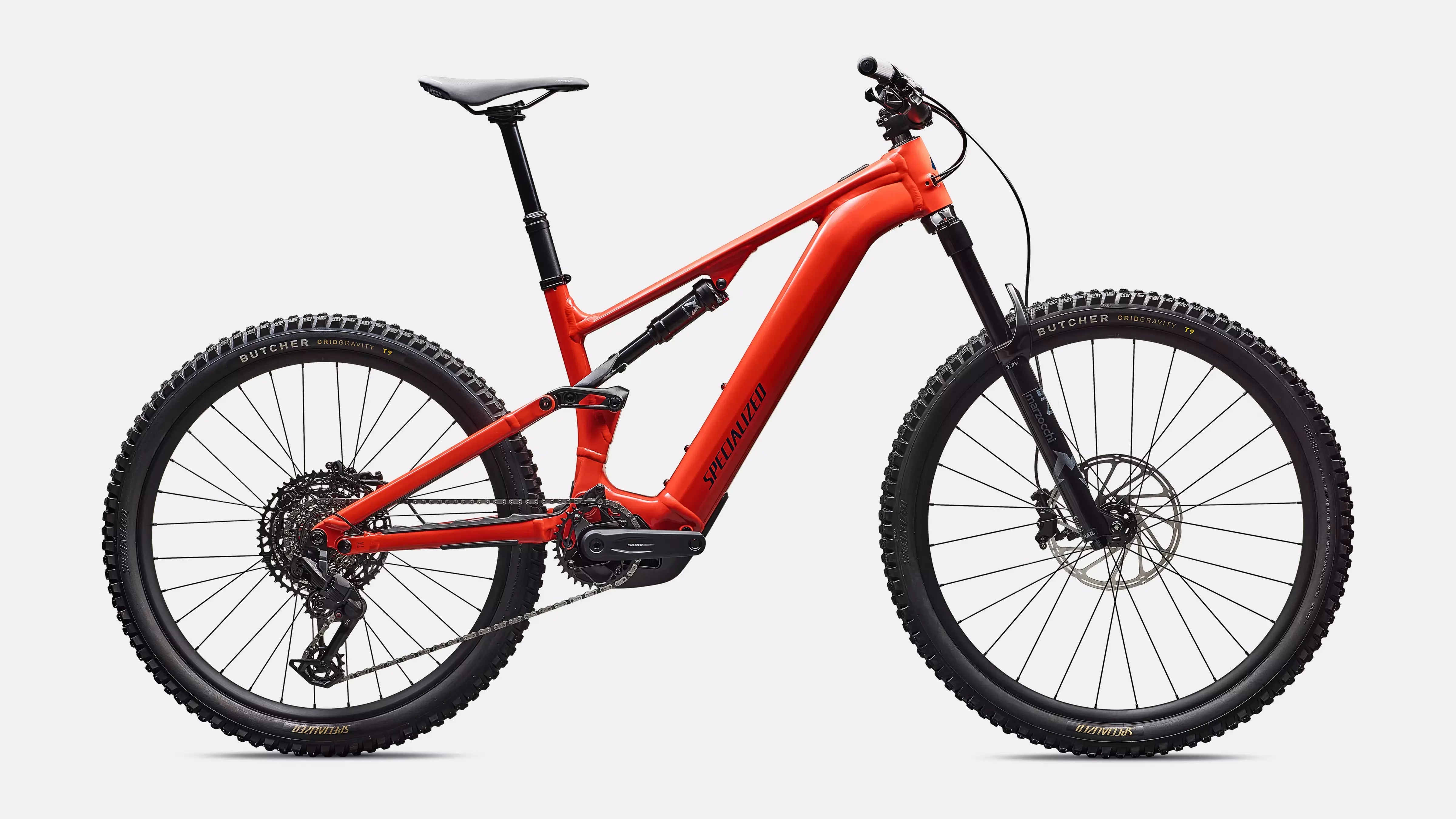 Red Specialized electric mountain bike on a white background