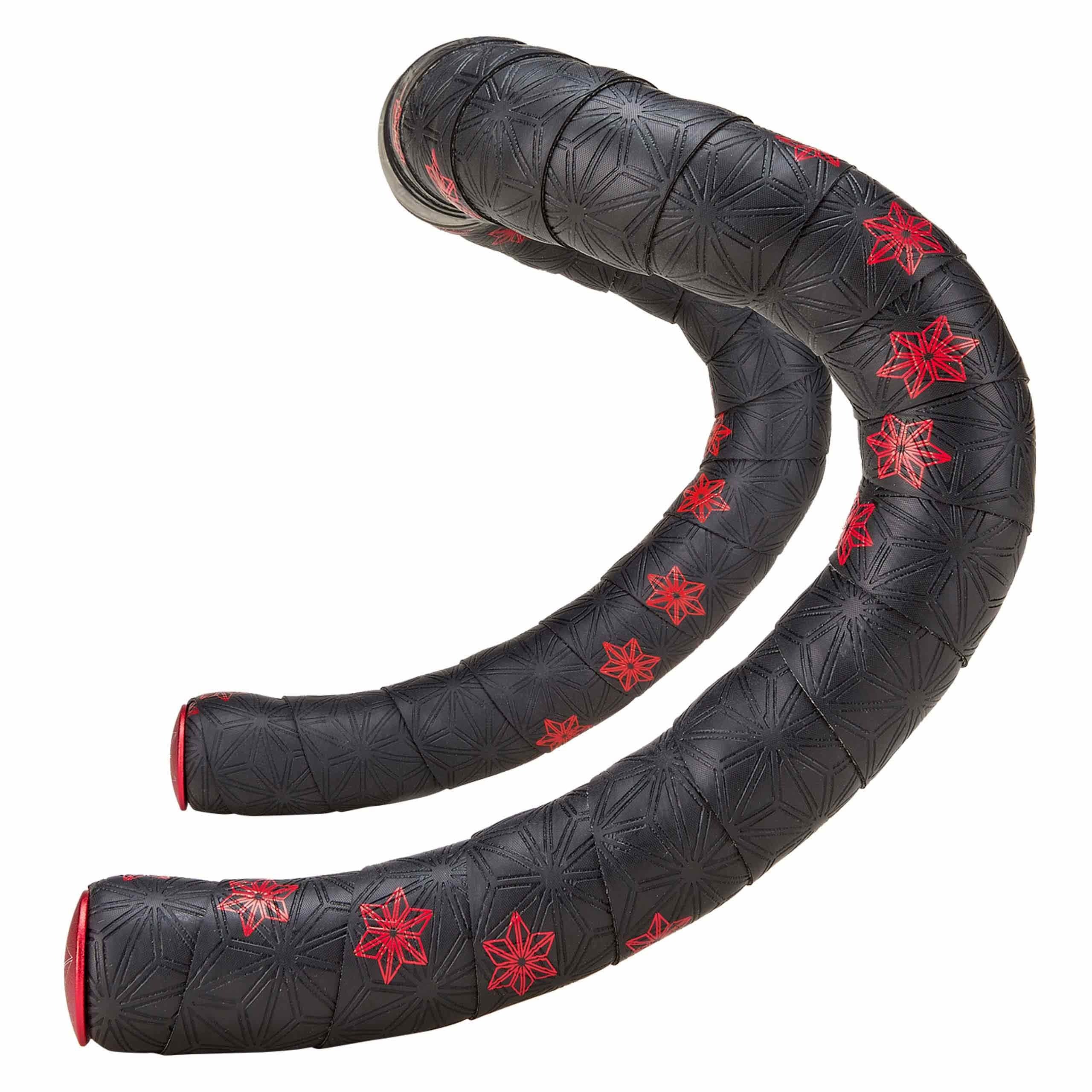Black road bike bar tape with red star patterns on a white background