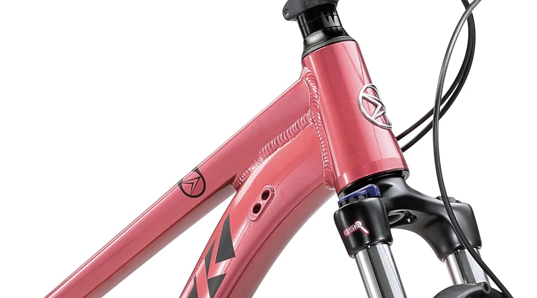 A close up of the front of a pinky red ladies mountain bike with a white background