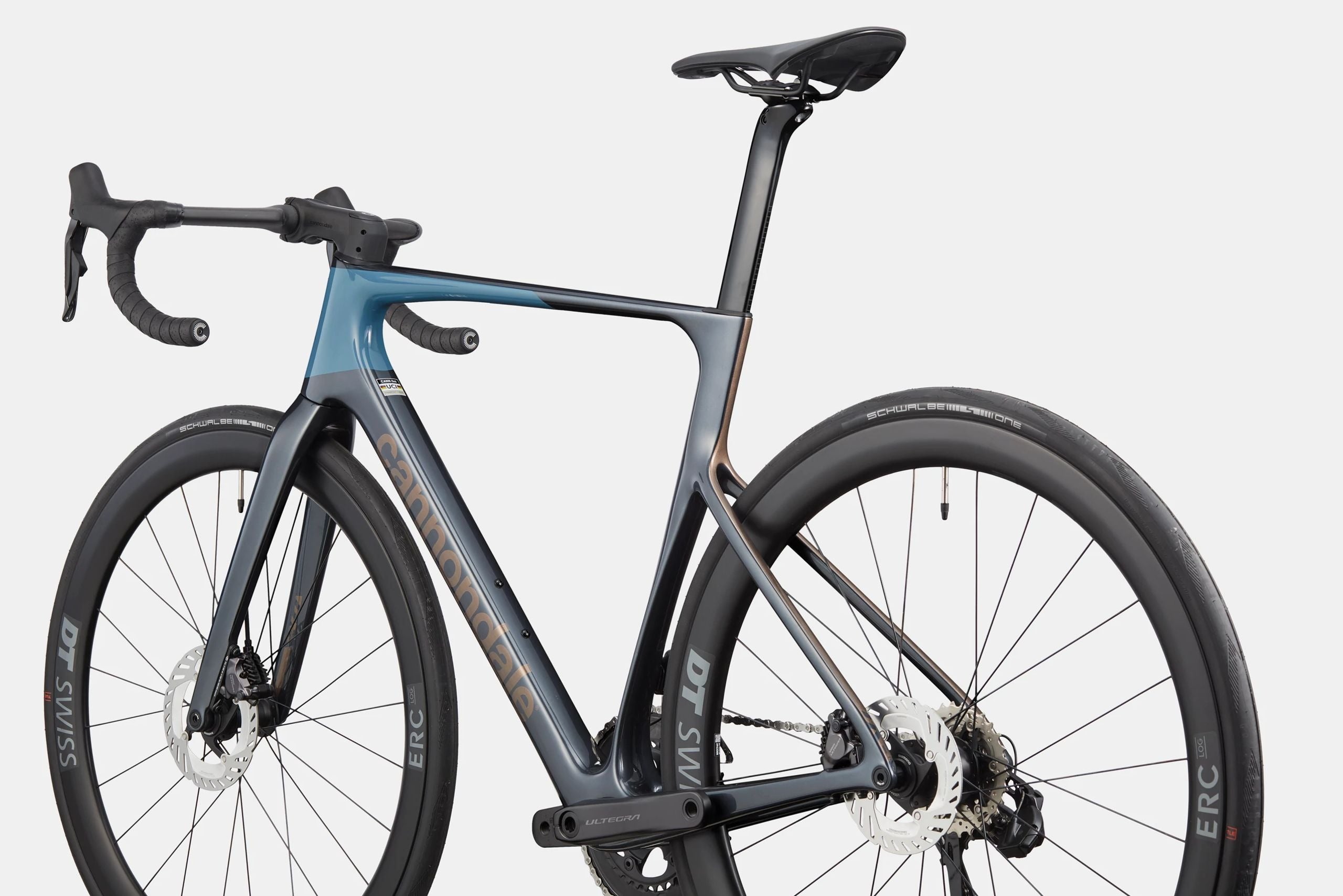 Cannondale blue and black road bike on a white background