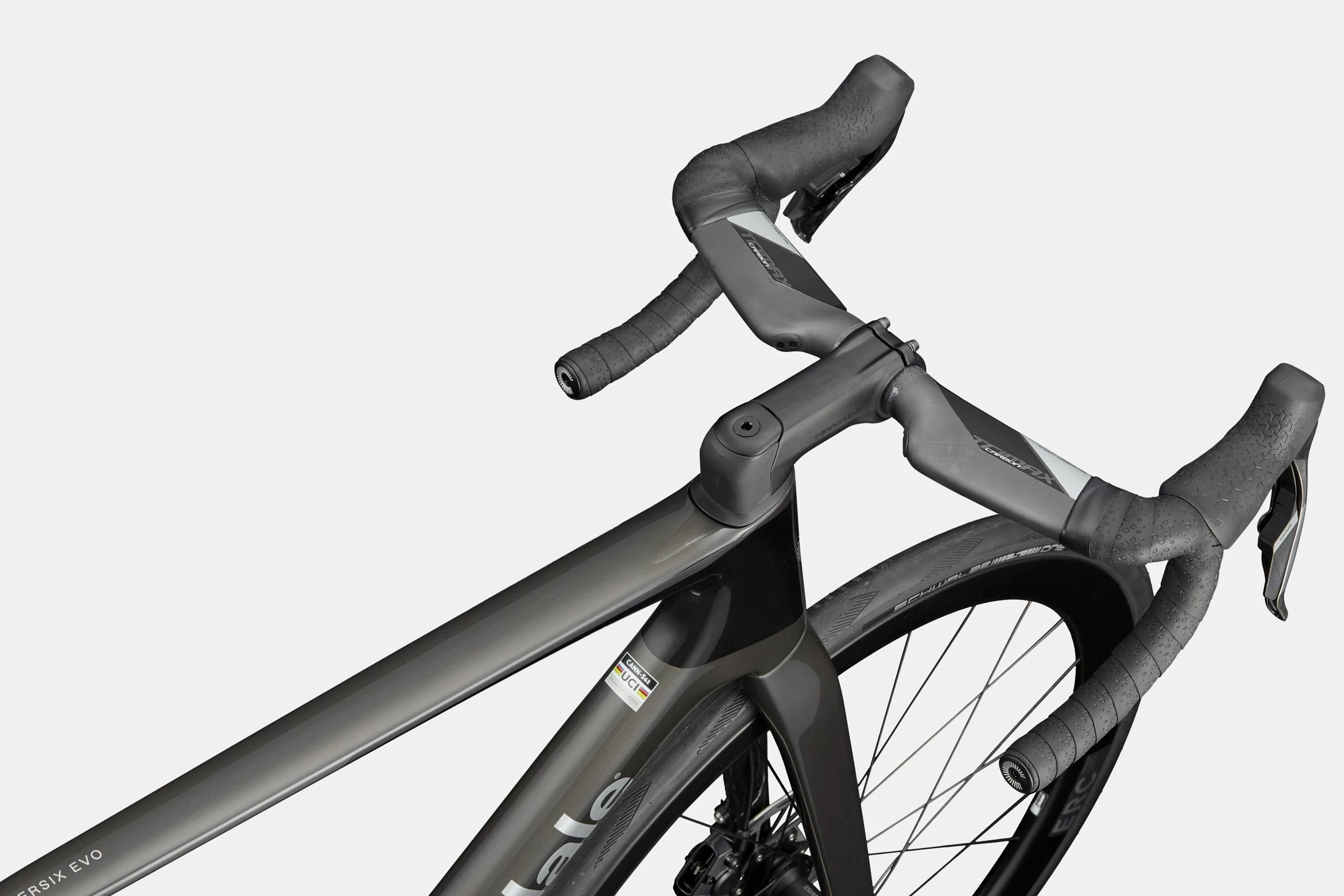 Close-up of a road bike aero drop handlebar and frame on a white background