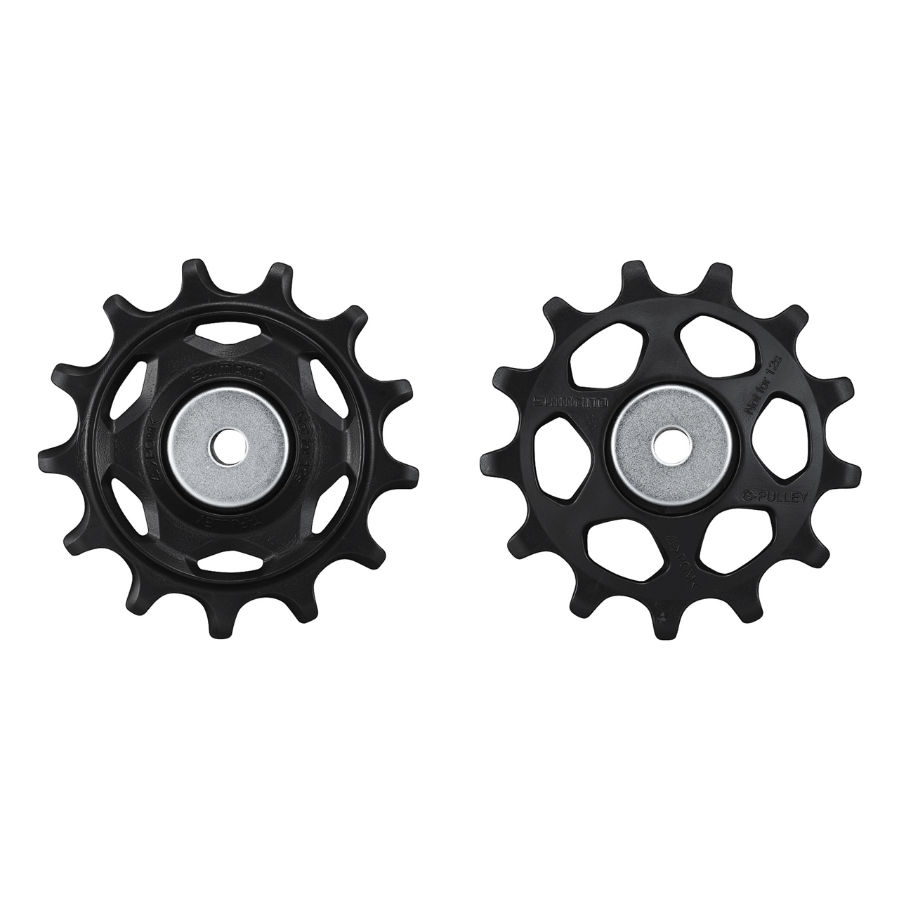 Two black bicycle pulley wheels on a white background