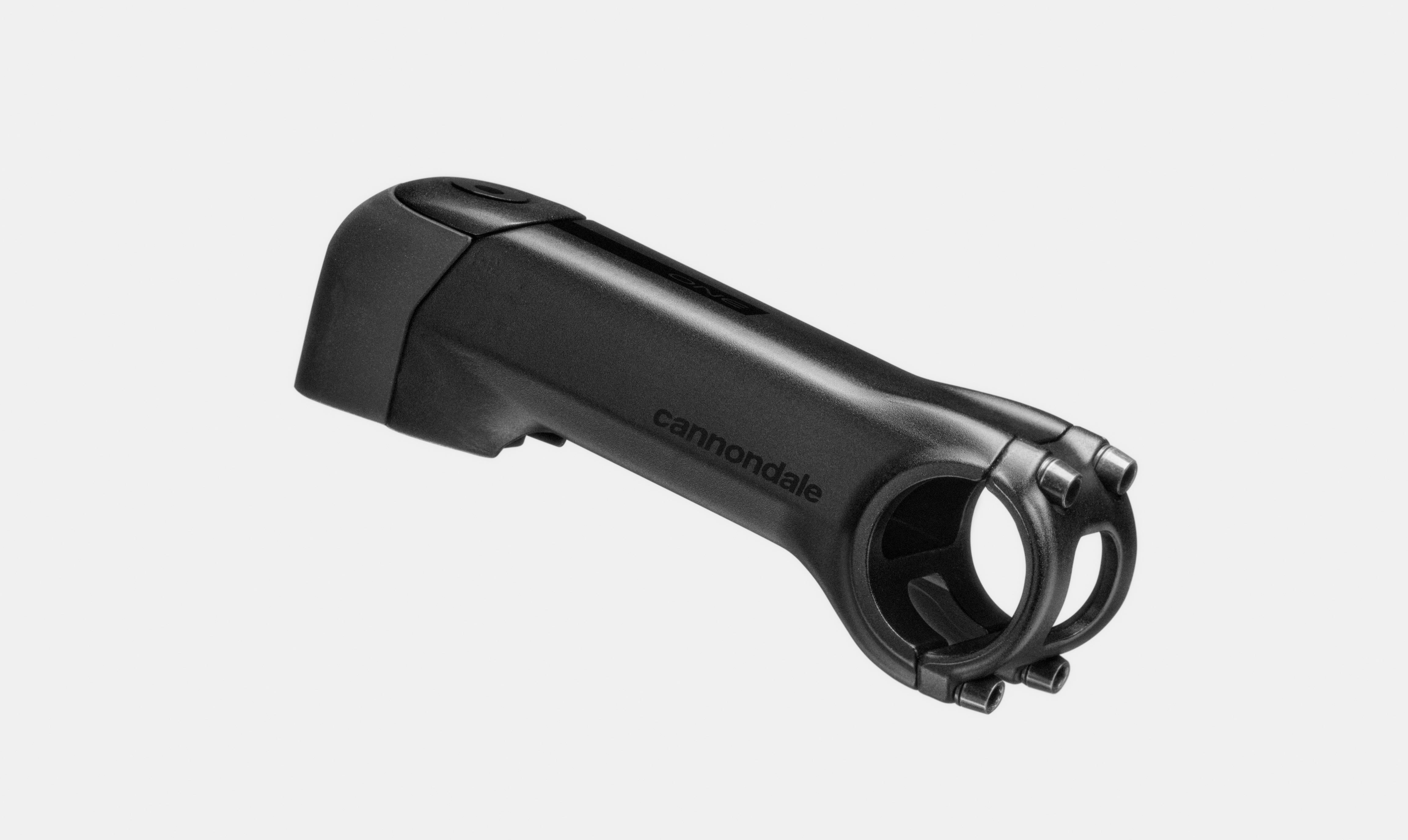 Black bicycle stem with Cannondale branding on a white background