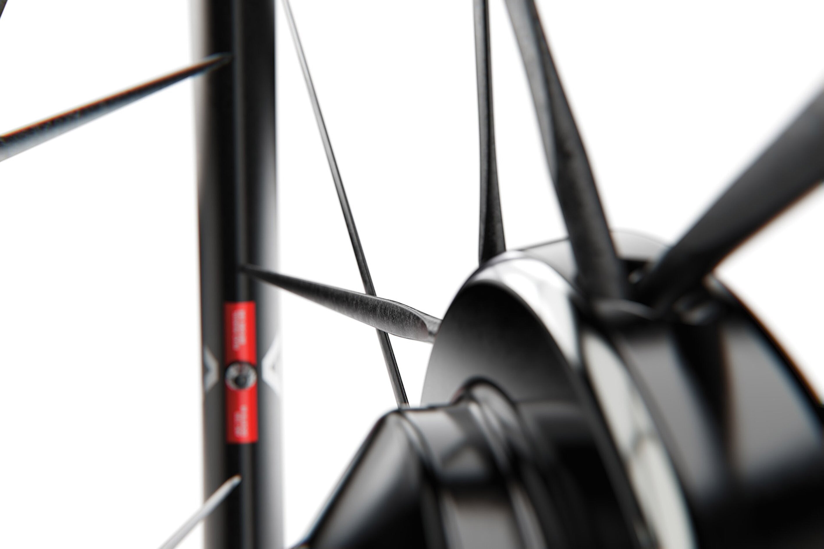 Close-up of a bicycle wheel with a blurred background