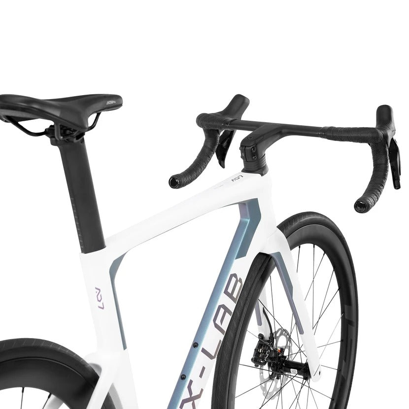 White road bike with black components on a white background