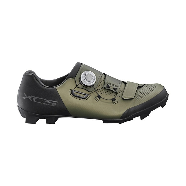 Green and black Shimano XC5 mountain bike shoe on a white background