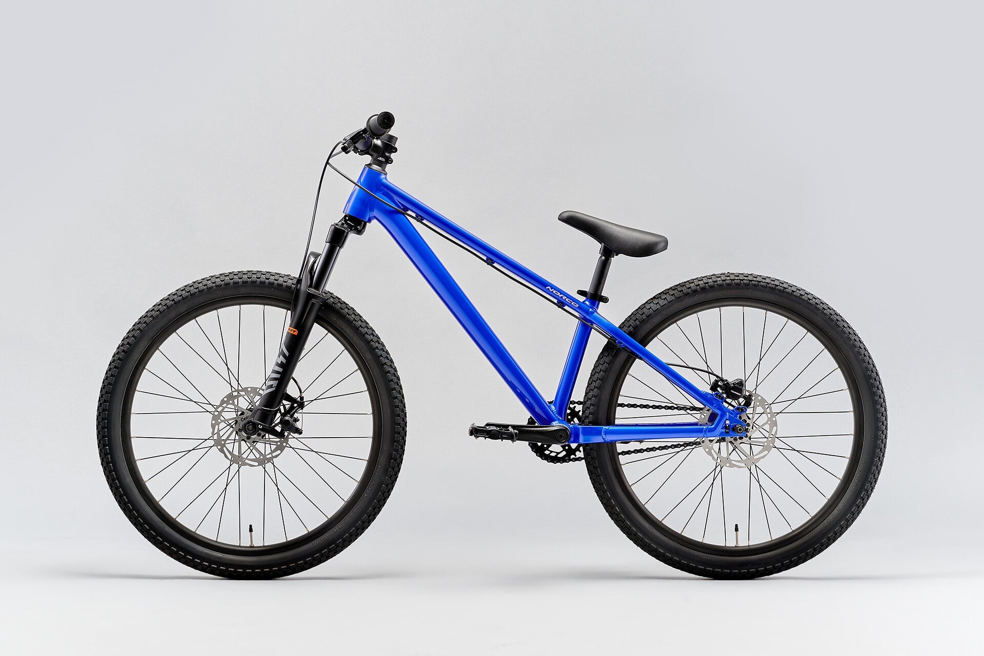 A picture of the blue Norco Rampage 24 Youth Dirt Jumper Bike