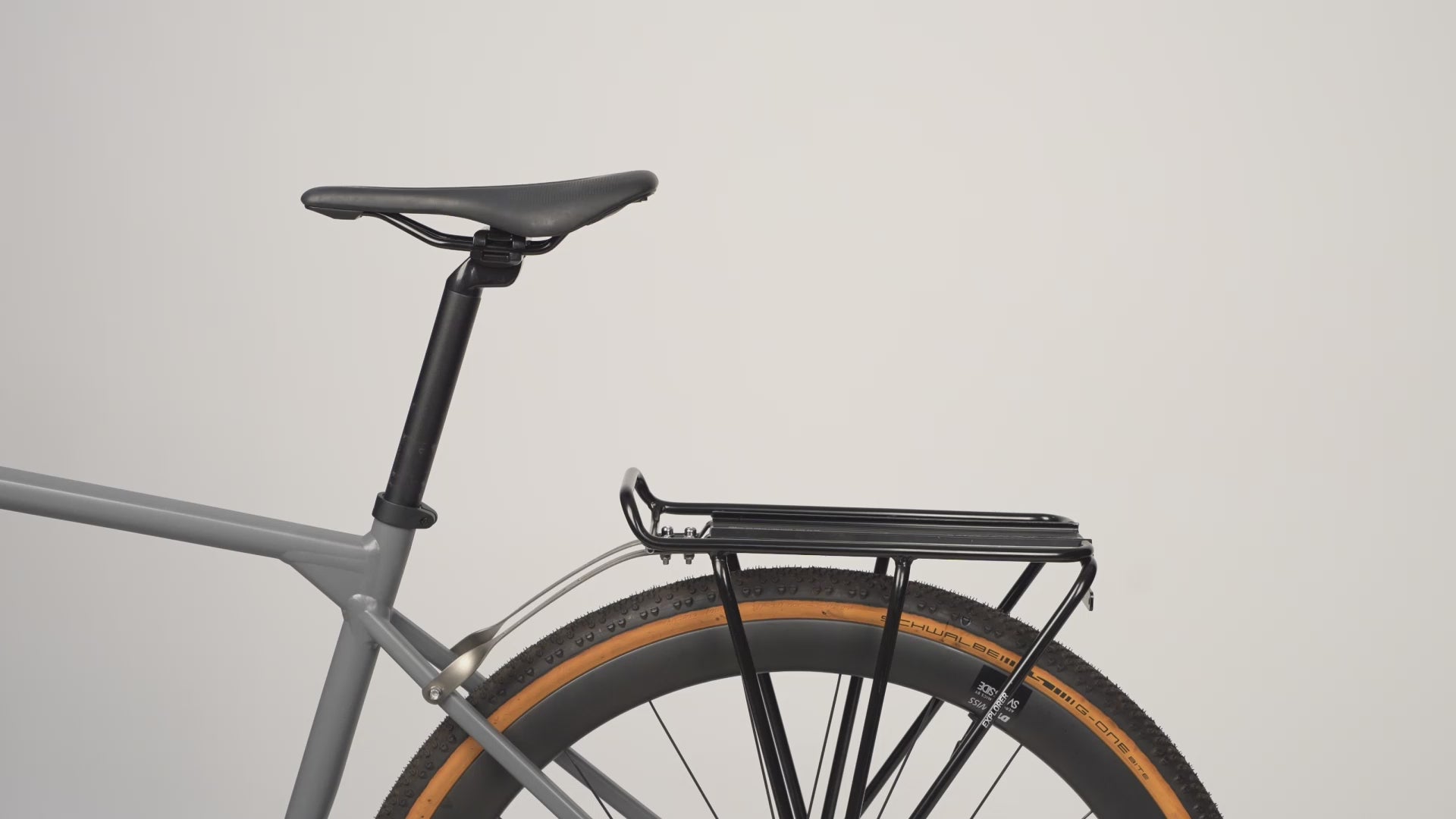 A video showing how to clip the Topeak MTX2 Pannier Bag onto a pannier rack of a bike