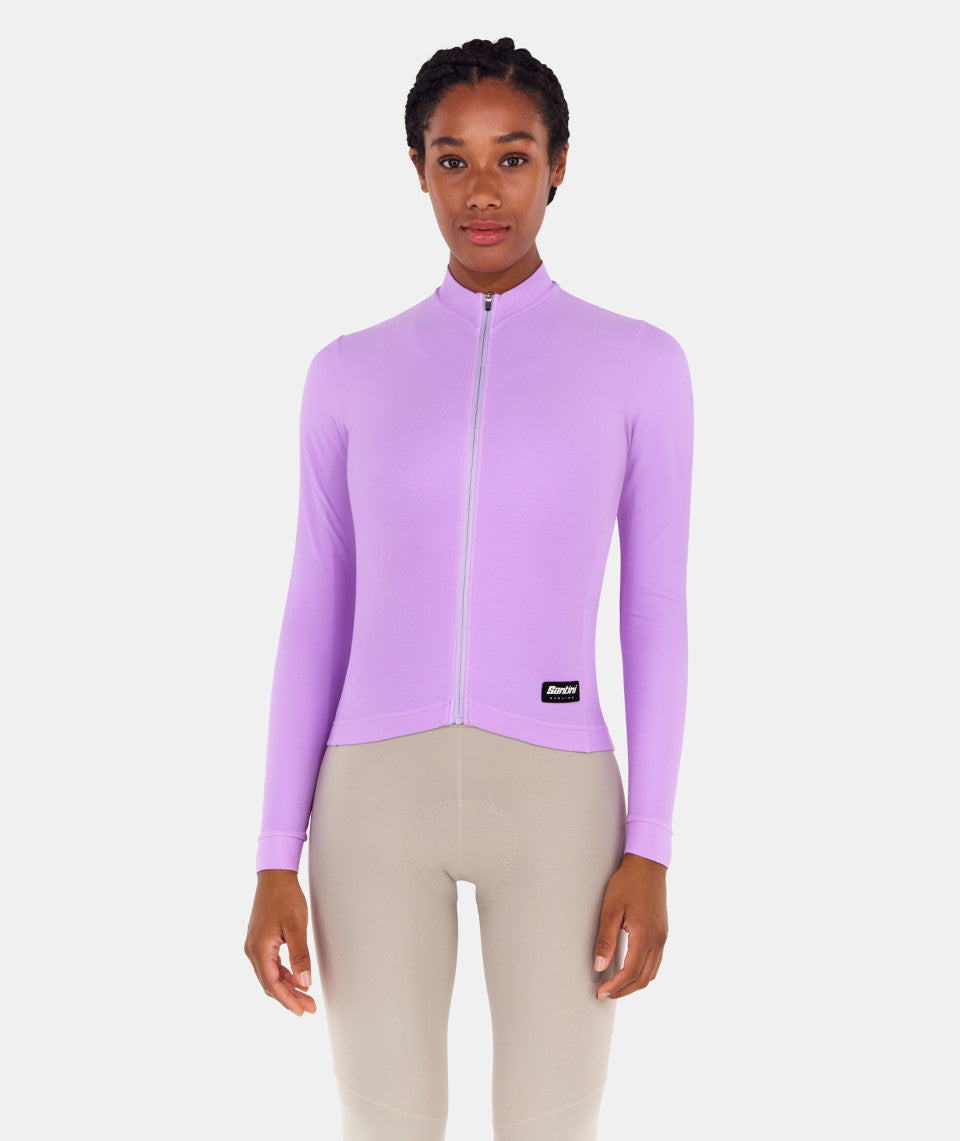 A picture of a lady wearing the lilac Santini Long Sleeve Unisex Winter Fleece Jersey